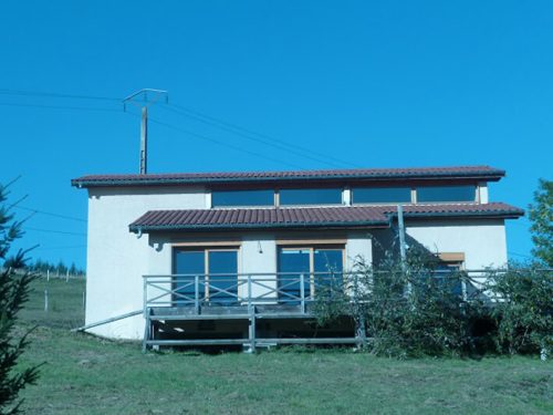 Maison d'architecte crépie en ossature bois - Saint-Bonnet-le-Troncy